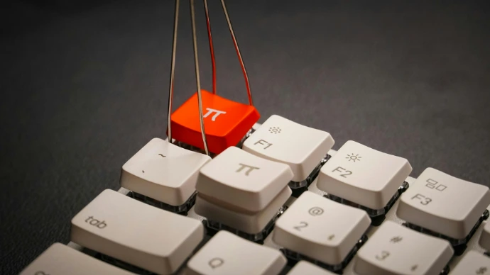 a white keyboard with a red block attached to it
